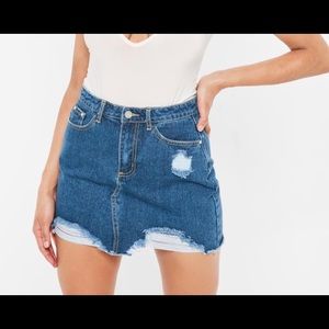 Blue ripped denim skirt